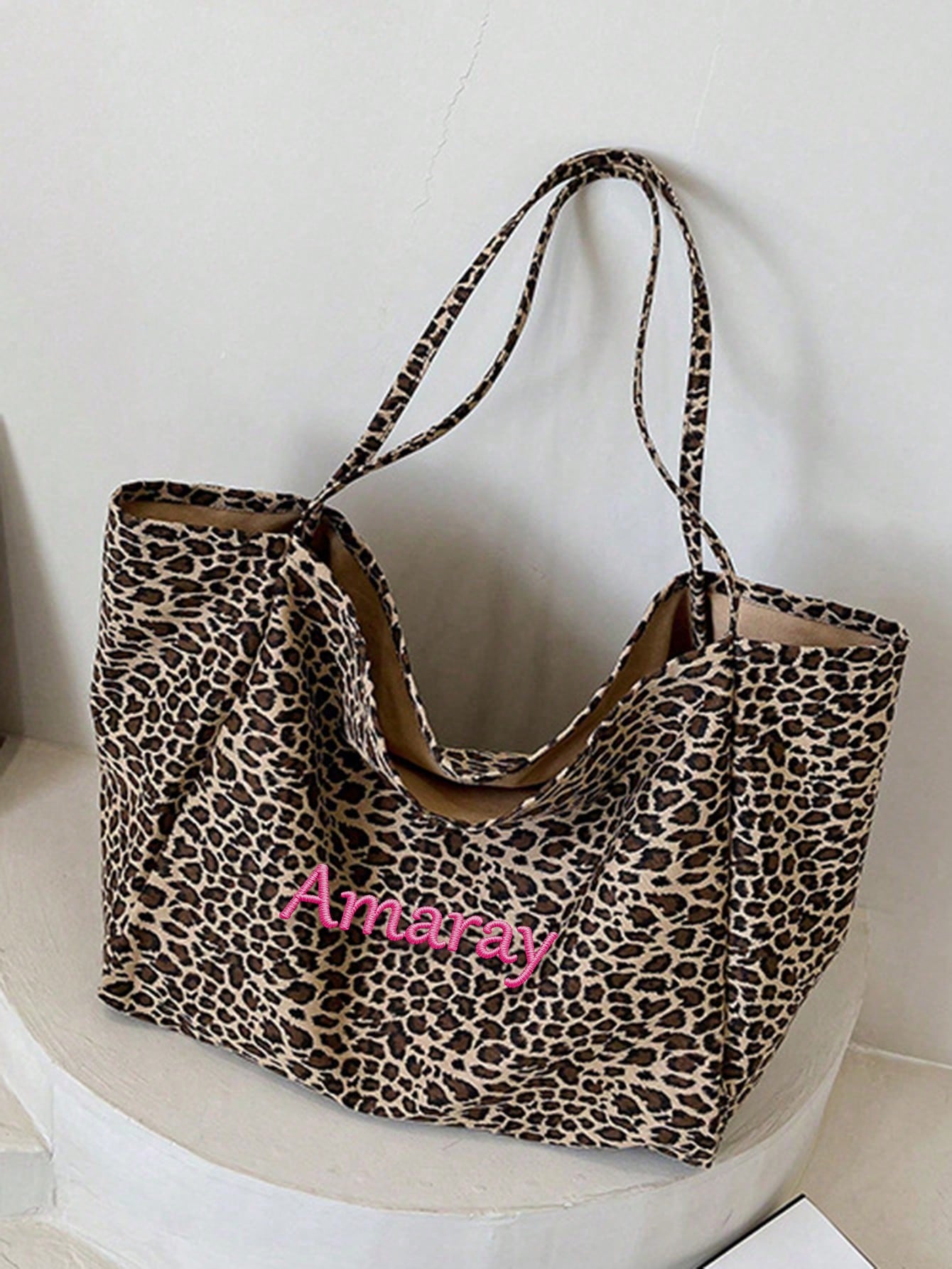 Bolso de mano con estampado de - Embroidery Name reseña y precio