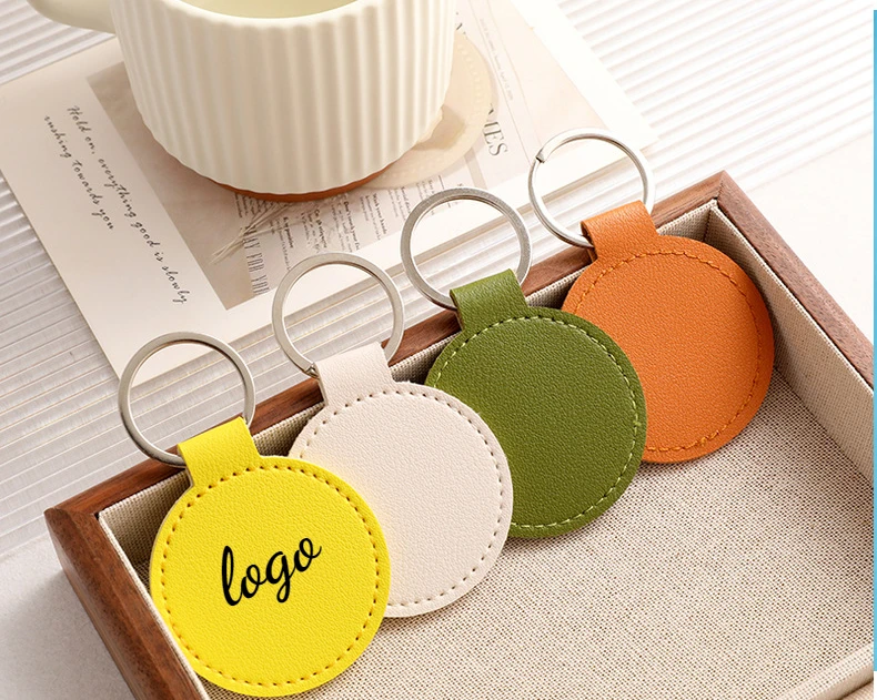 LLavero redondo de cuero PU co - Embroidery Name reseña y precio